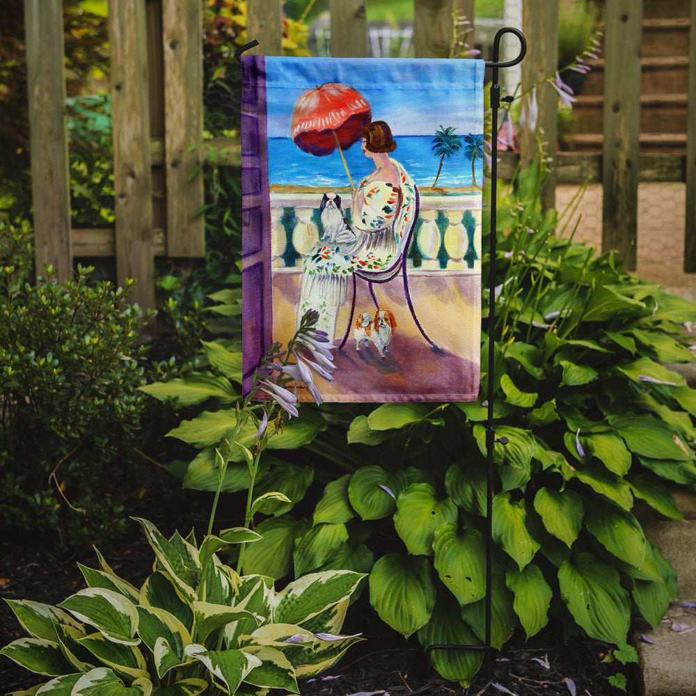 Lady with her Japanese Chin Flag Garden Size.