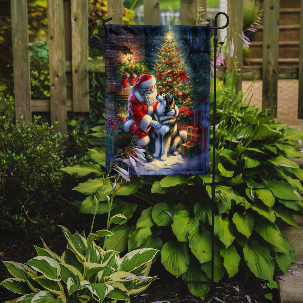 Alaskan Malamute and Santa Claus Garden Flag