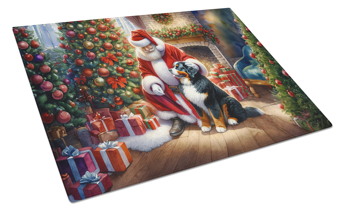 Buy this Bernese Mountain Dog and Santa Claus Glass Cutting Board