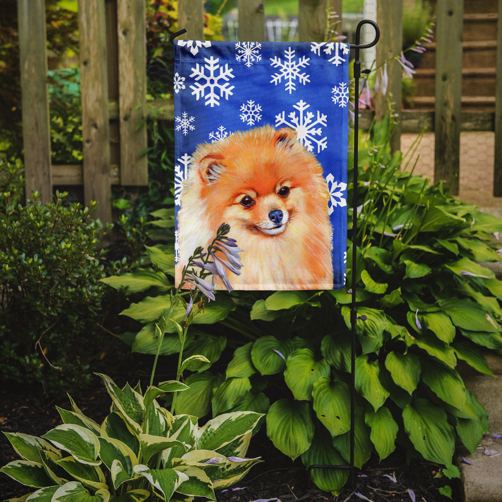 Pomeranian Winter Snowflakes Holiday Flag Garden Size.