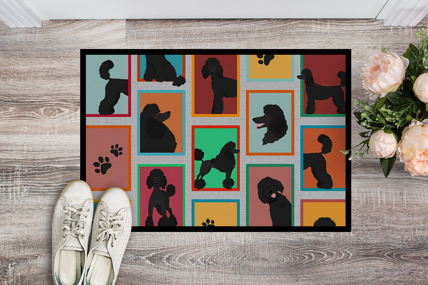 Buy this Lots of Black Standard Poodle Indoor or Outdoor Mat 24x36