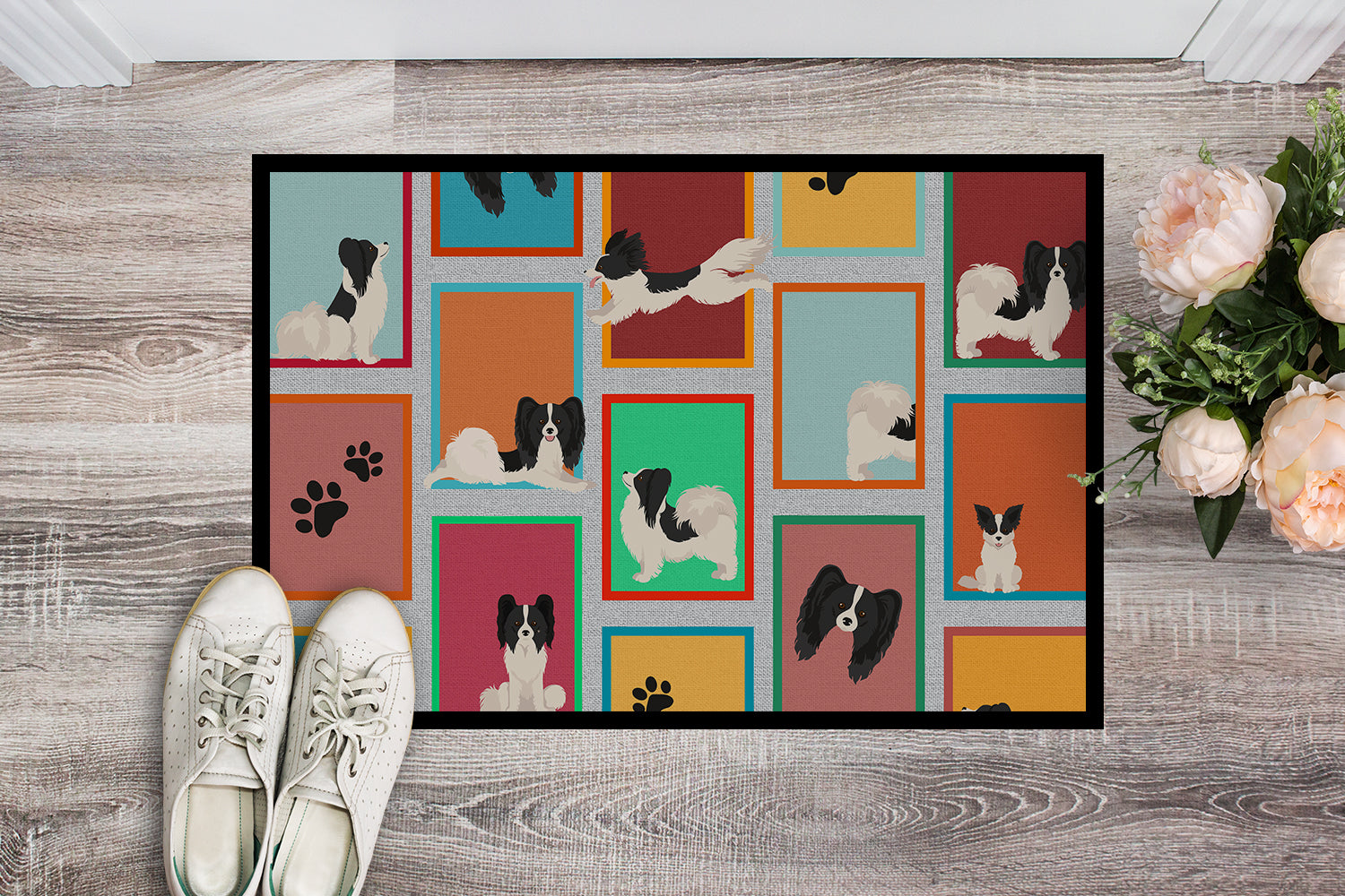 Buy this Lots of Black and Whtie Papillon Indoor or Outdoor Mat 18x27