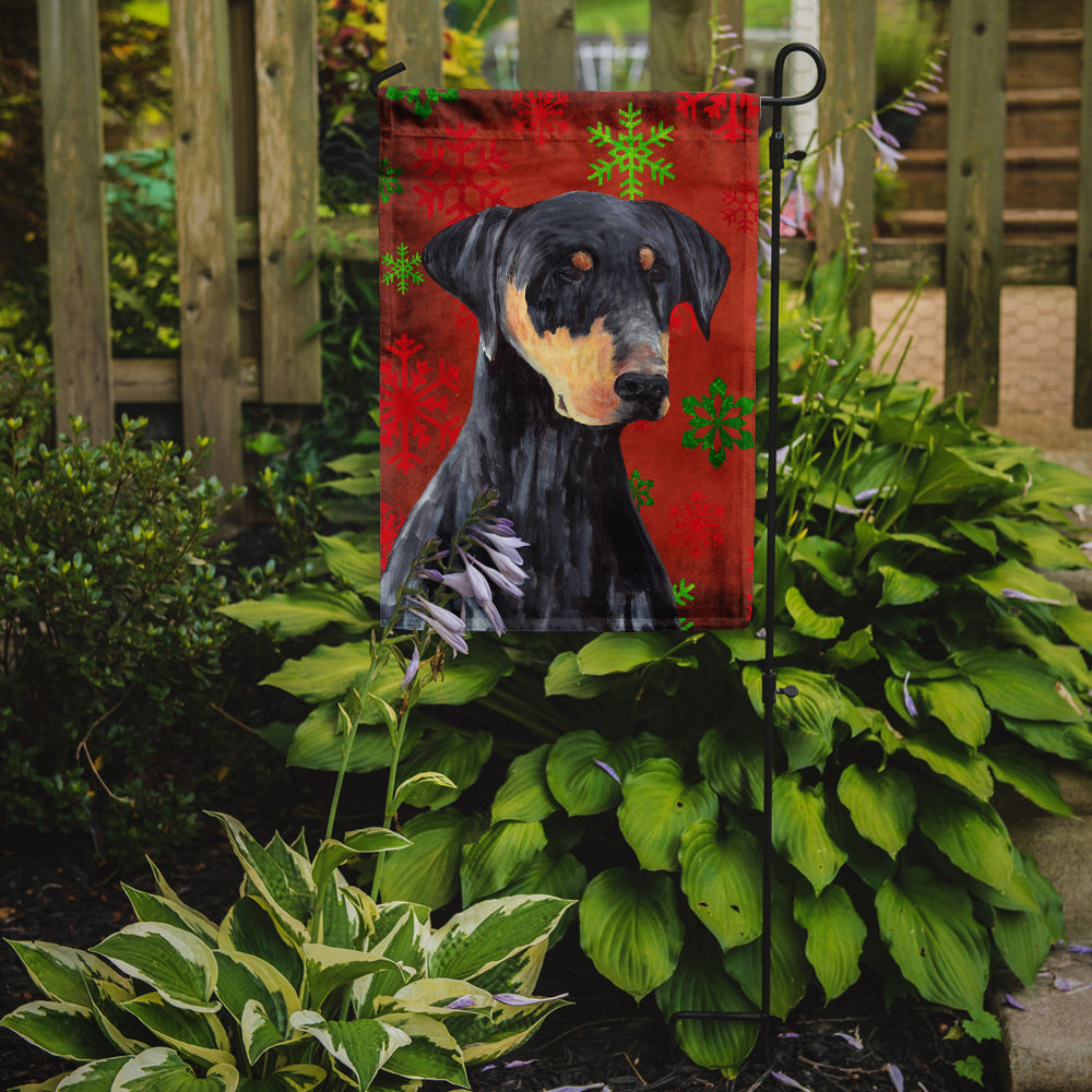 Doberman Red and Green Snowflakes Holiday Christmas Flag Garden Size.