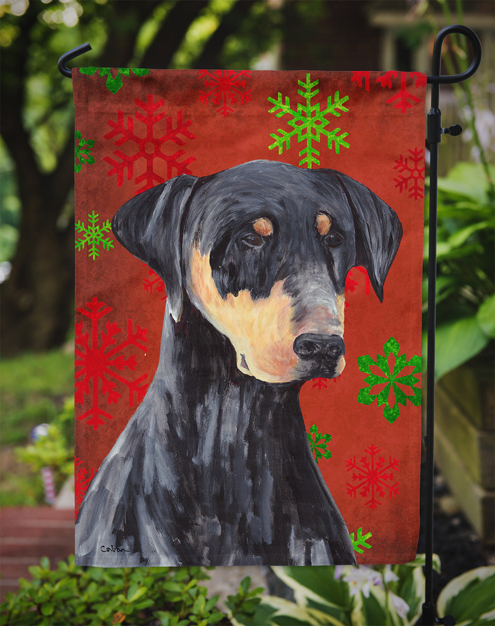 Doberman Red and Green Snowflakes Holiday Christmas Flag Garden Size.