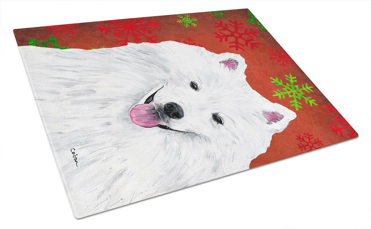 American Eskimo Red and Green Snowflakes Christmas Glass Cutting Board Large by Caroline&#39;s Treasures