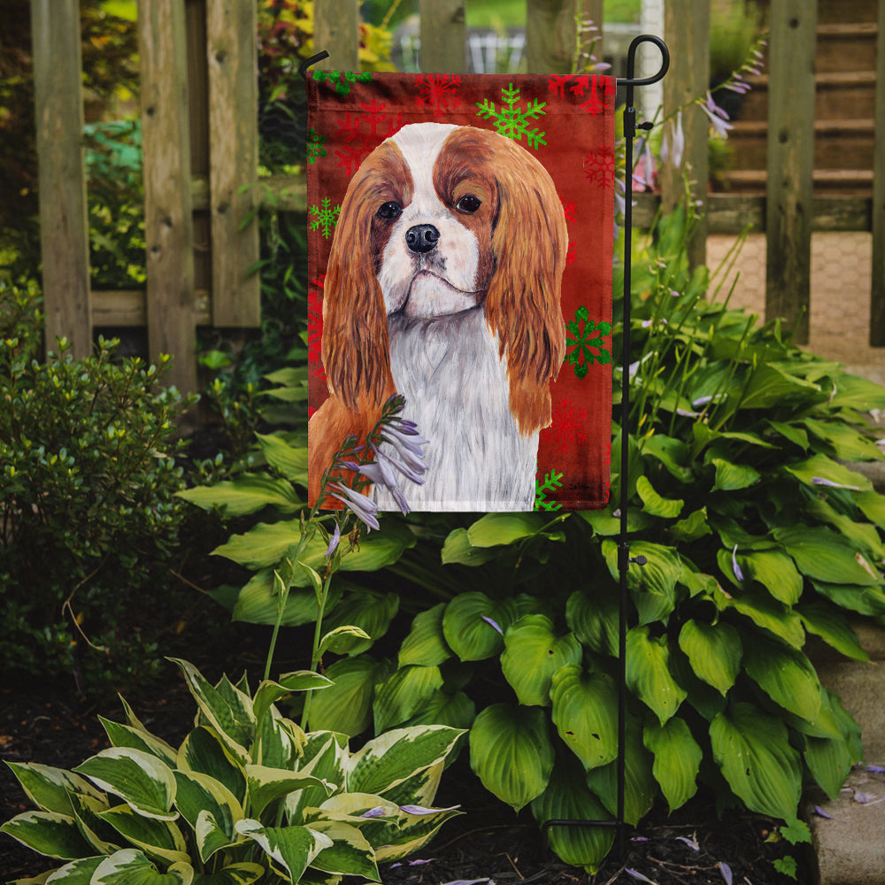 Cavalier Spaniel Red and Green Snowflakes Holiday Christmas Flag Garden Size.