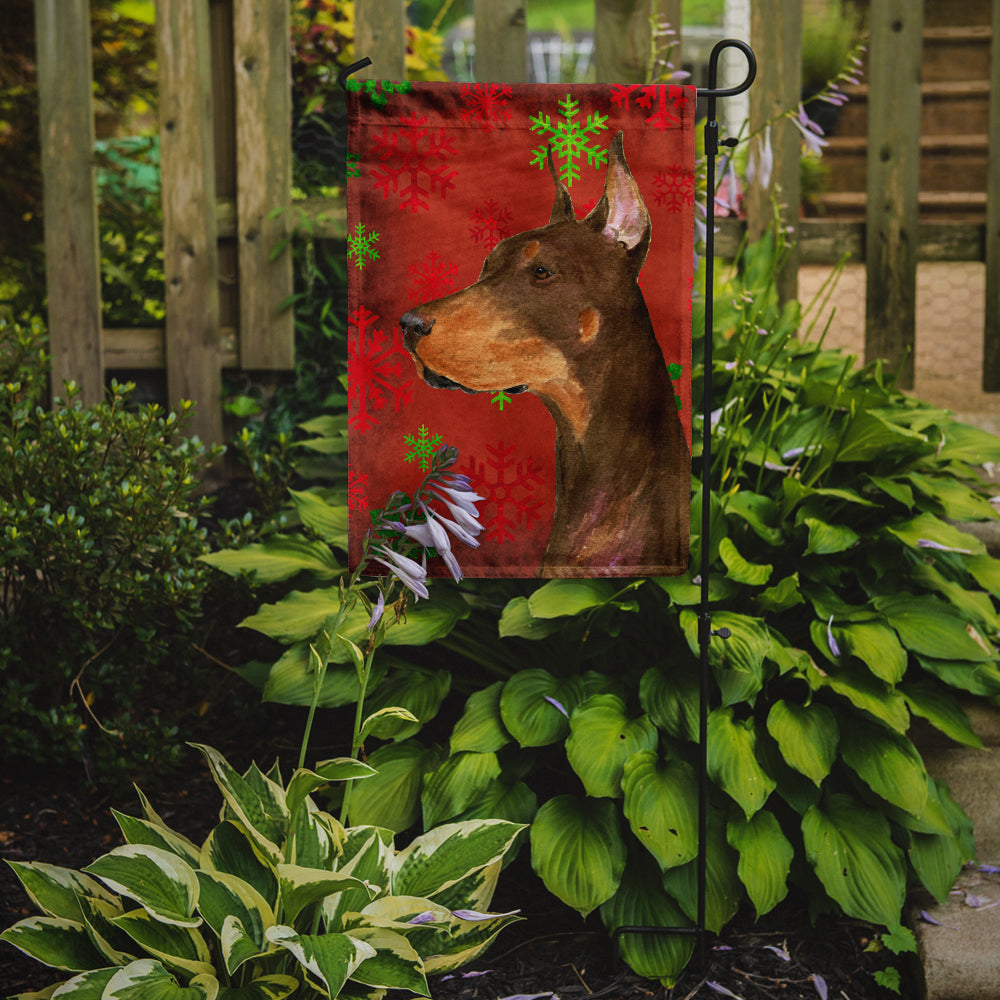 Doberman Red and Green Snowflakes Holiday Christmas Flag Garden Size.