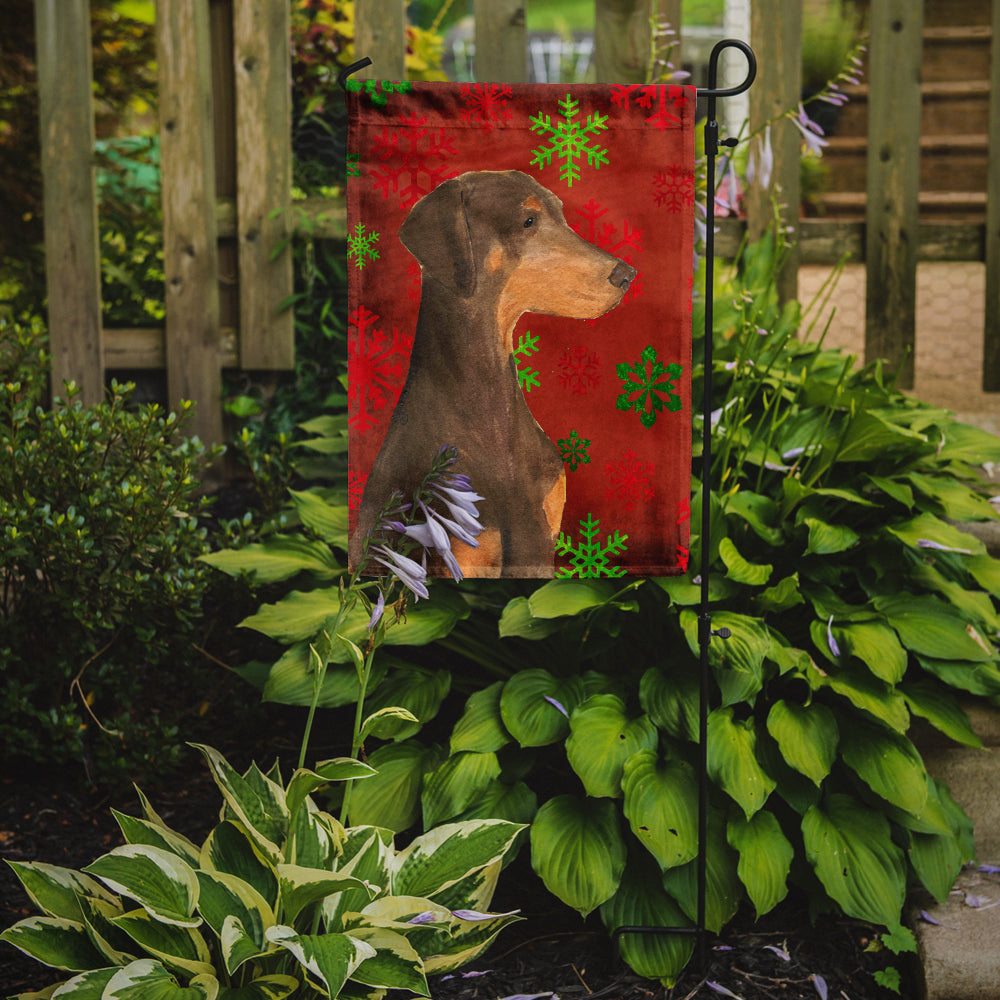 Doberman Red and Green Snowflakes Holiday Christmas Flag Garden Size.