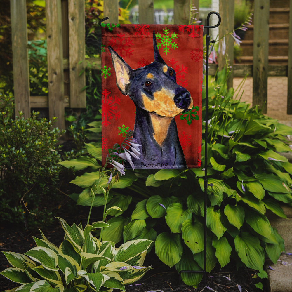 Doberman Red and Green Snowflakes Holiday Christmas Flag Garden Size.