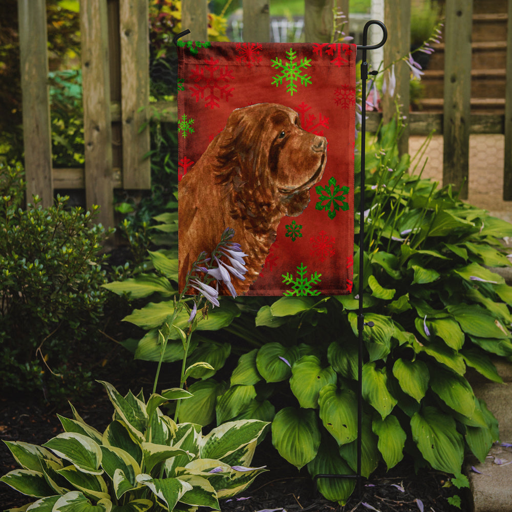 Sussex Spaniel Red Green Snowflake Holiday Christmas Flag Garden Size.