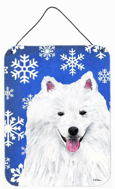 American Eskimo Winter Snowflakes Holiday Metal Wall or Door Hanging Prints by Caroline&#39;s Treasures